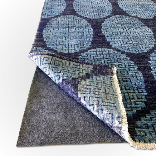 Everything you should know about rug pads under Hand-Knotted Rugs